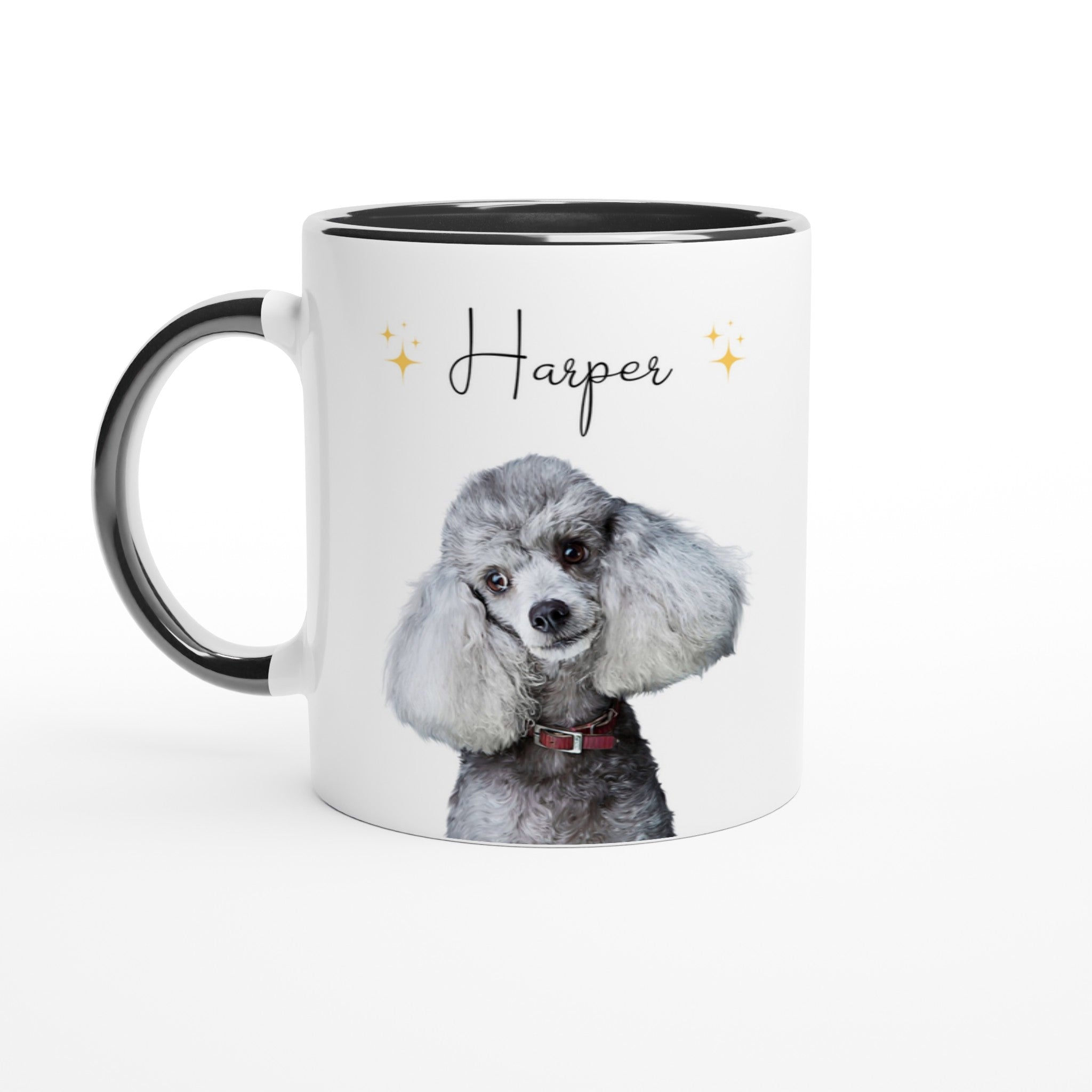 Custom pet portrait mug. Poodle with pet name above dog. Stars on each side of name. Black mug interior and handle.