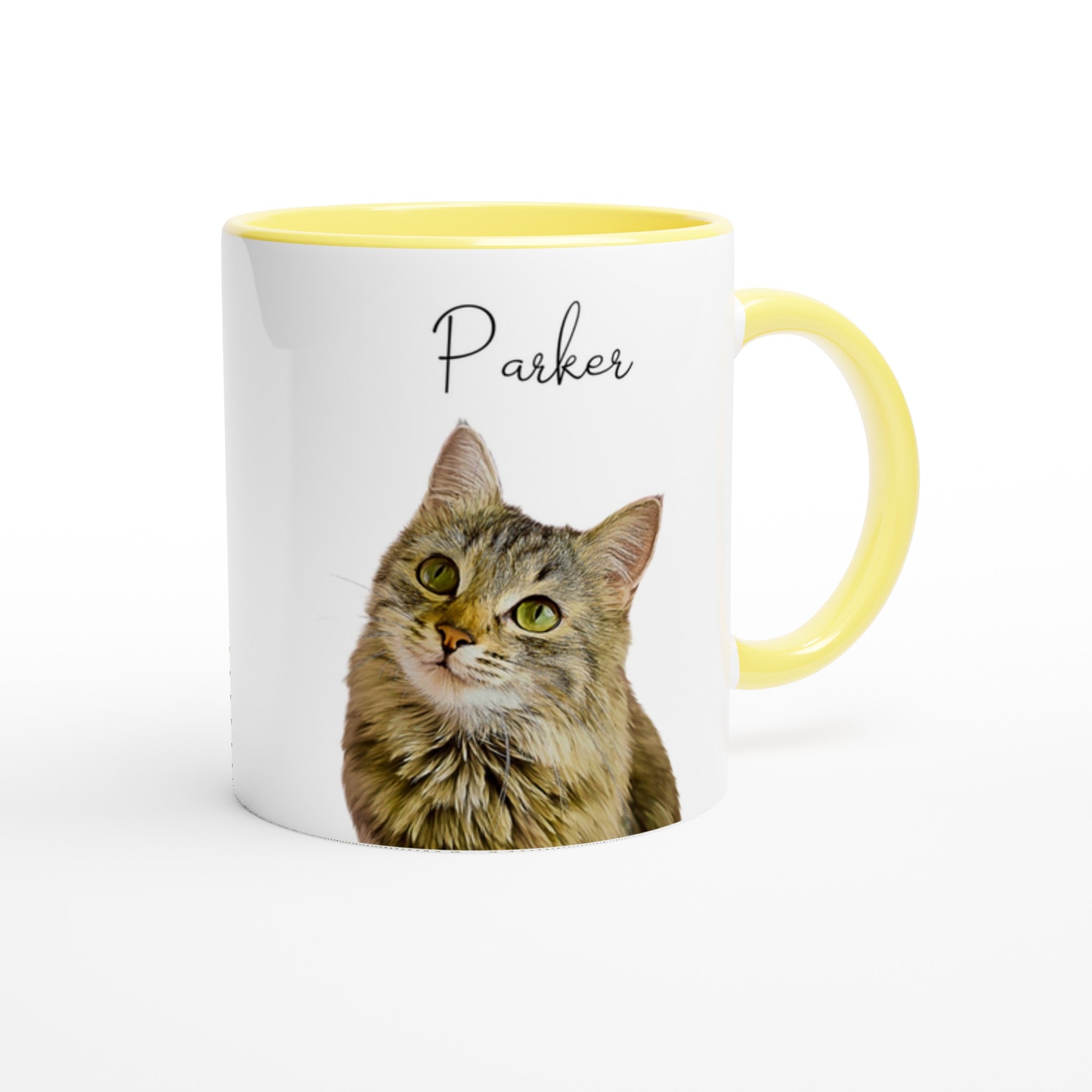 Custom pet portrait mug. Tabby cat with pet name above cat with yellow mug interior and handle.