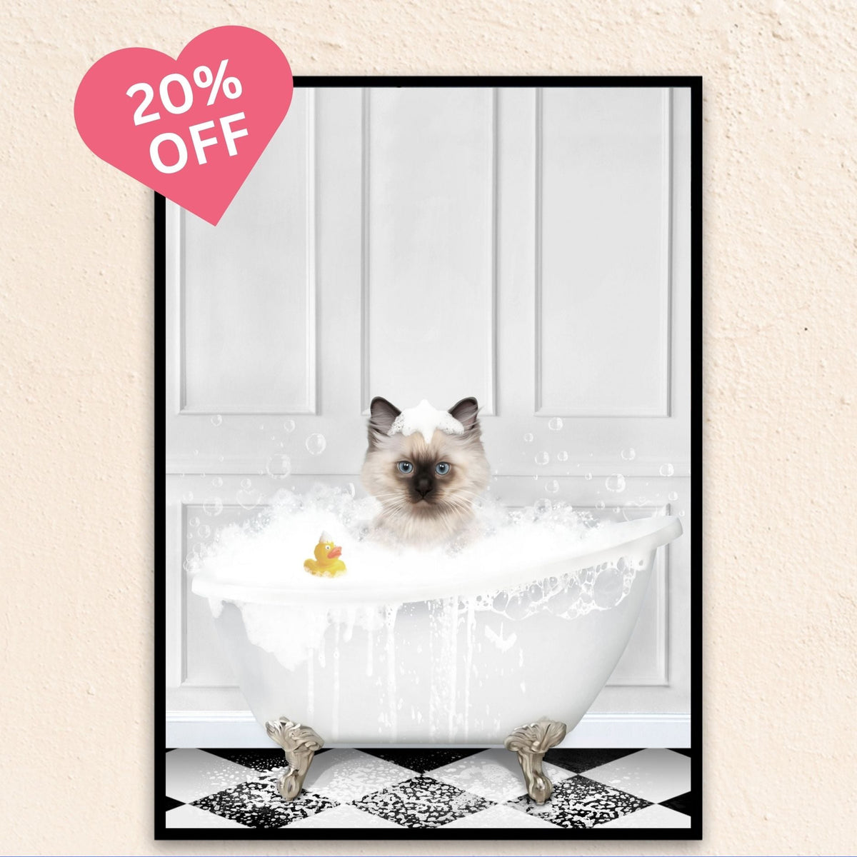 Bright white backdrop cat portrait of a feline relaxing in a vintage tub with bubbles.
