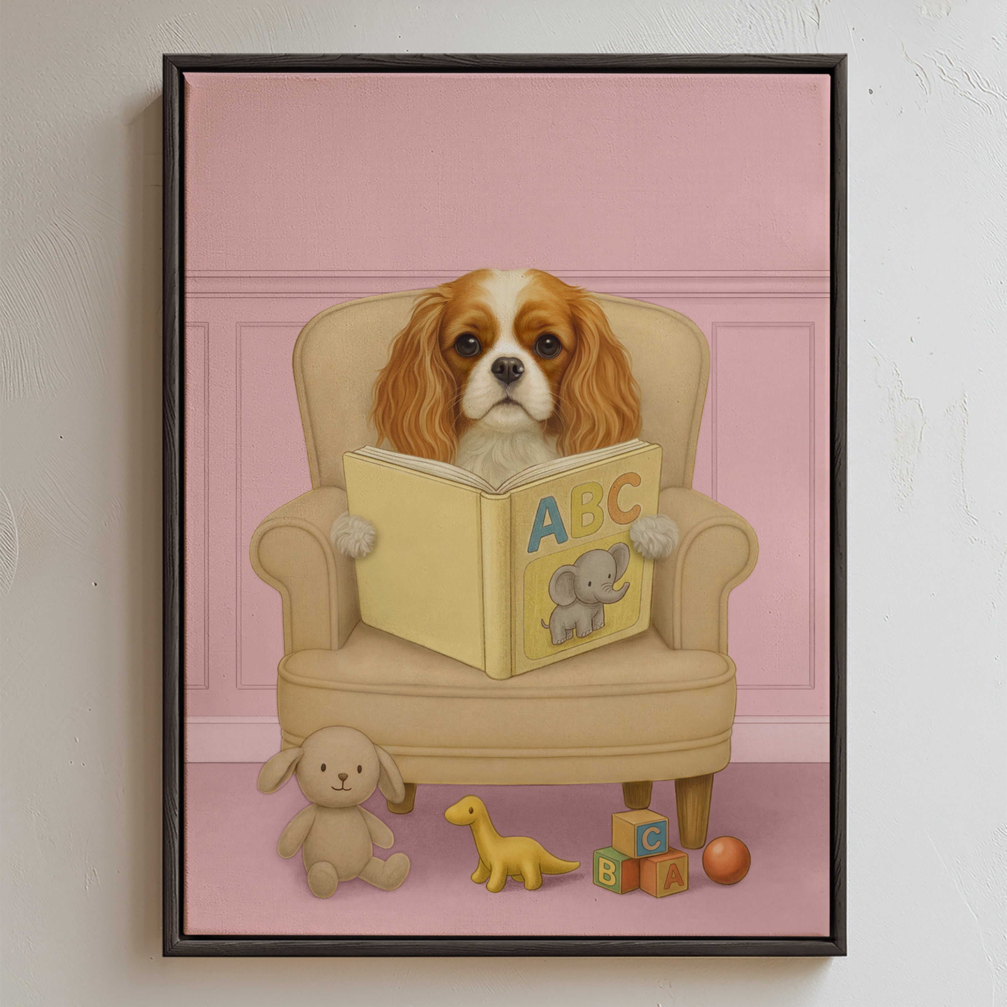Custom pet portrait of a Spaniel pup sitting and reading in a baby pink room, sitting on a beige armchair, holding a yellow ABC book with an elephant illustration, surrounded by plush toys and alphabet blocks in a cozy space.