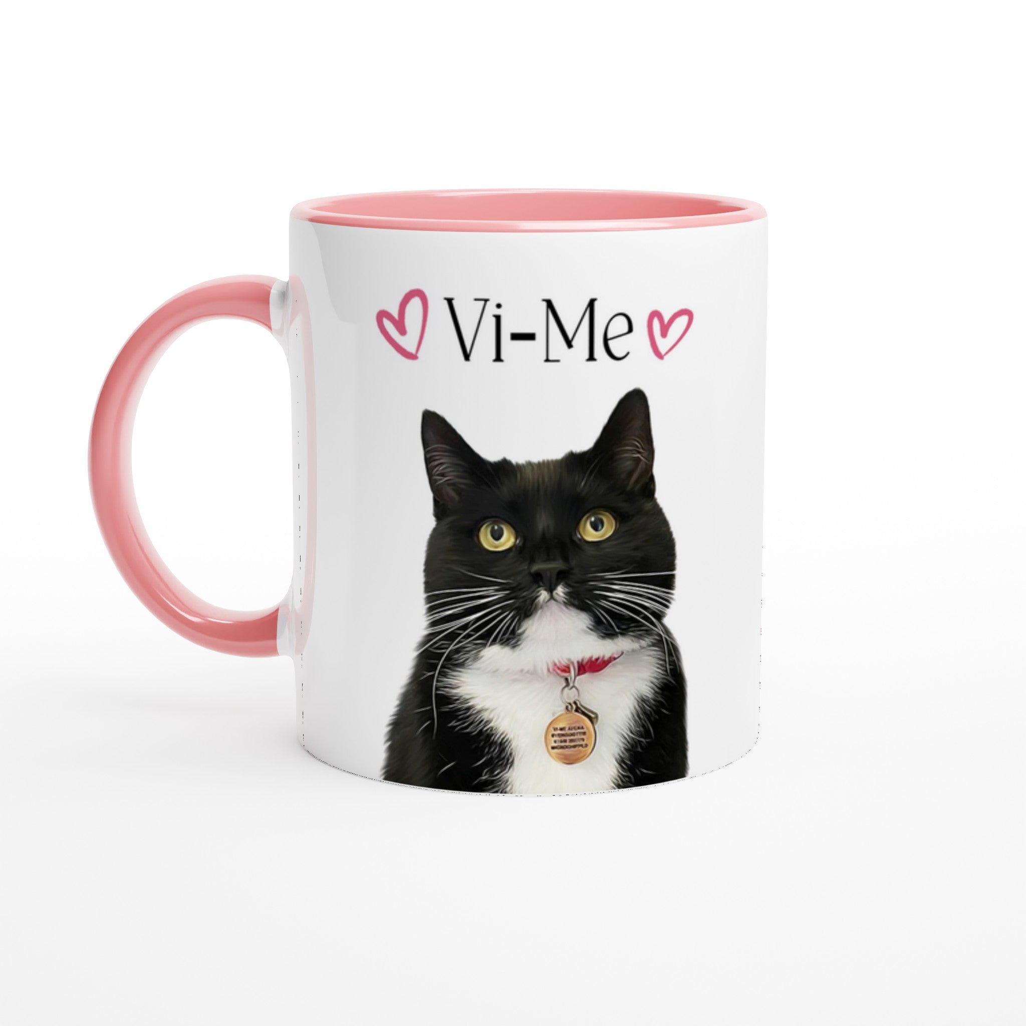 Custom pet portrait mug. Black and white cat with pet name above cat with pink mug interior and handle. 