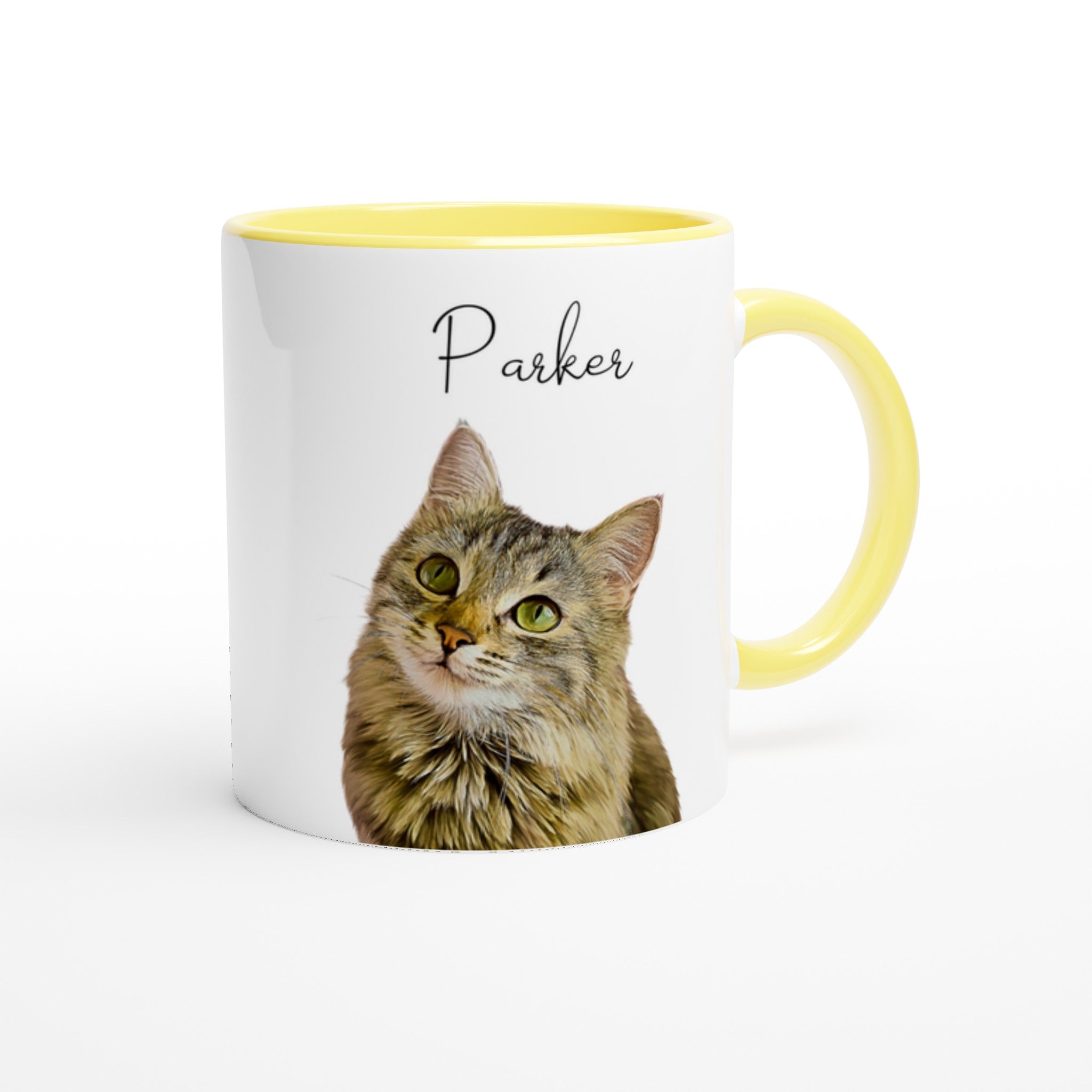 Custom pet portrait mug. Tabby cat with pet name above cat with yellow mug interior and handle. 