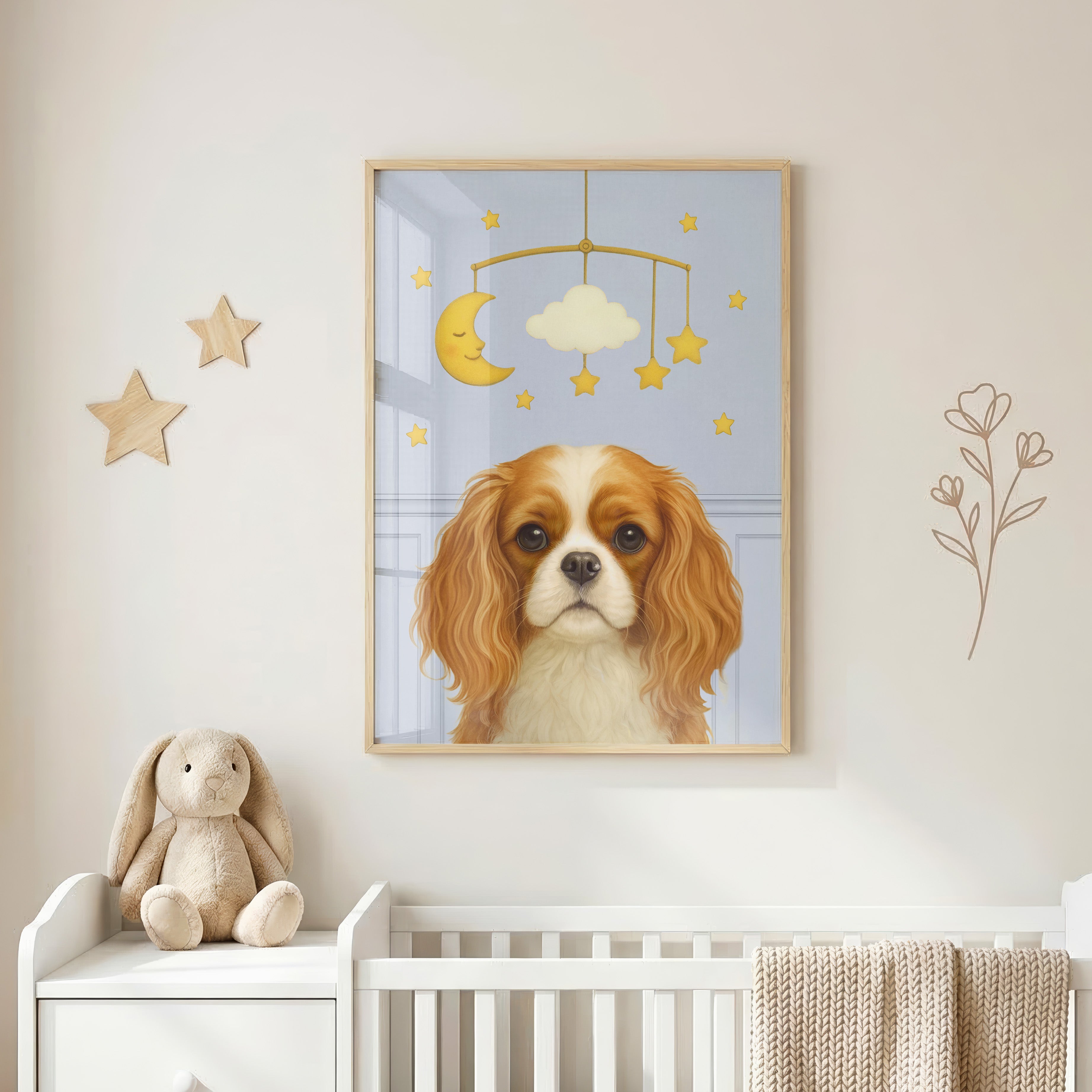Close-up of handcrafted nursery pet portrait in dusty blue backdrop showcasing a charming pup seated beneath a whimsical mobile.