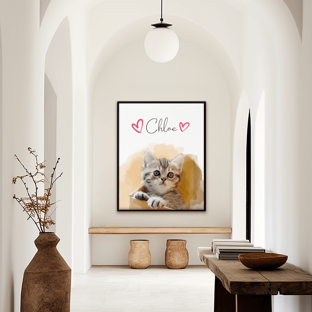 Custom watercolor pet portrait hallway wall art. Tabby kitten in cardboard box. Pet name at the top of the poster. Name has hearts on both side of the name. 