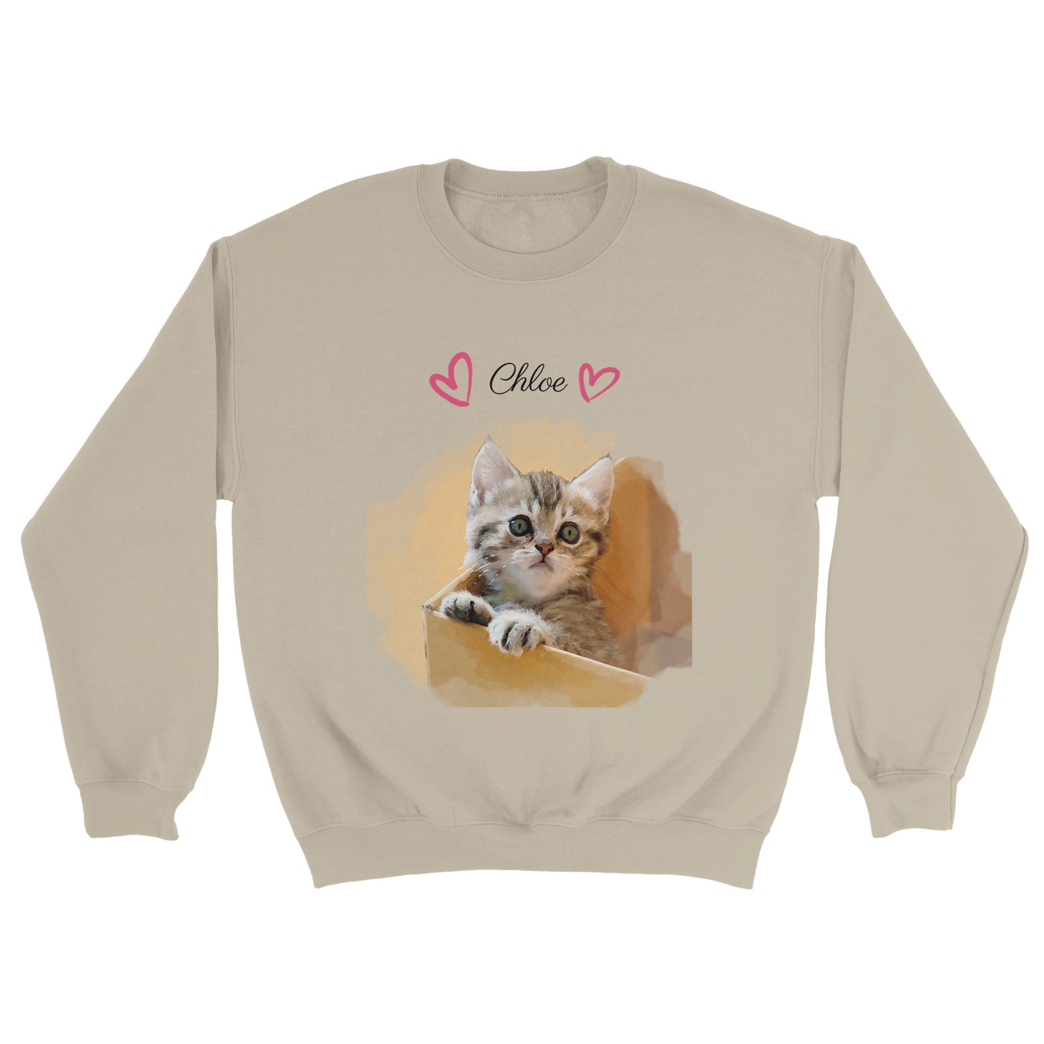 Custom watercolor pet portrait beige sweatshirt. Tabby kitten in cardboard box. Pet name at the top of sweatshirt. Name has pink hearts on both side of name.